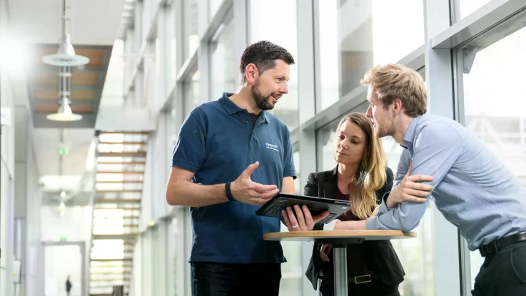 group of employees chatting